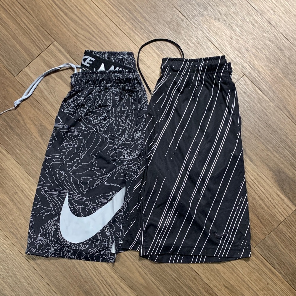 Nike Black Athletic Shorts with White Swoosh and Stripe Accents